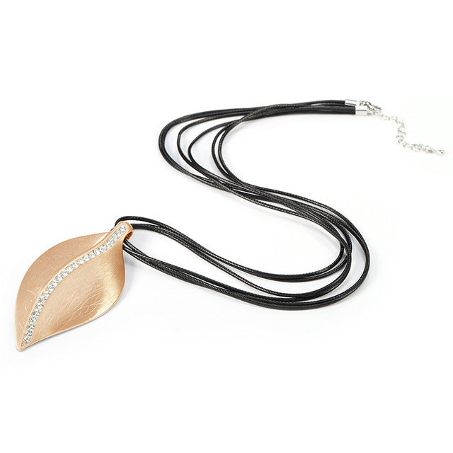 Autumn and winter new leaf short leather rope necklace Alloy leaf inlaid crystal sweater chain woman's accessories - EssentialBoutiques 
